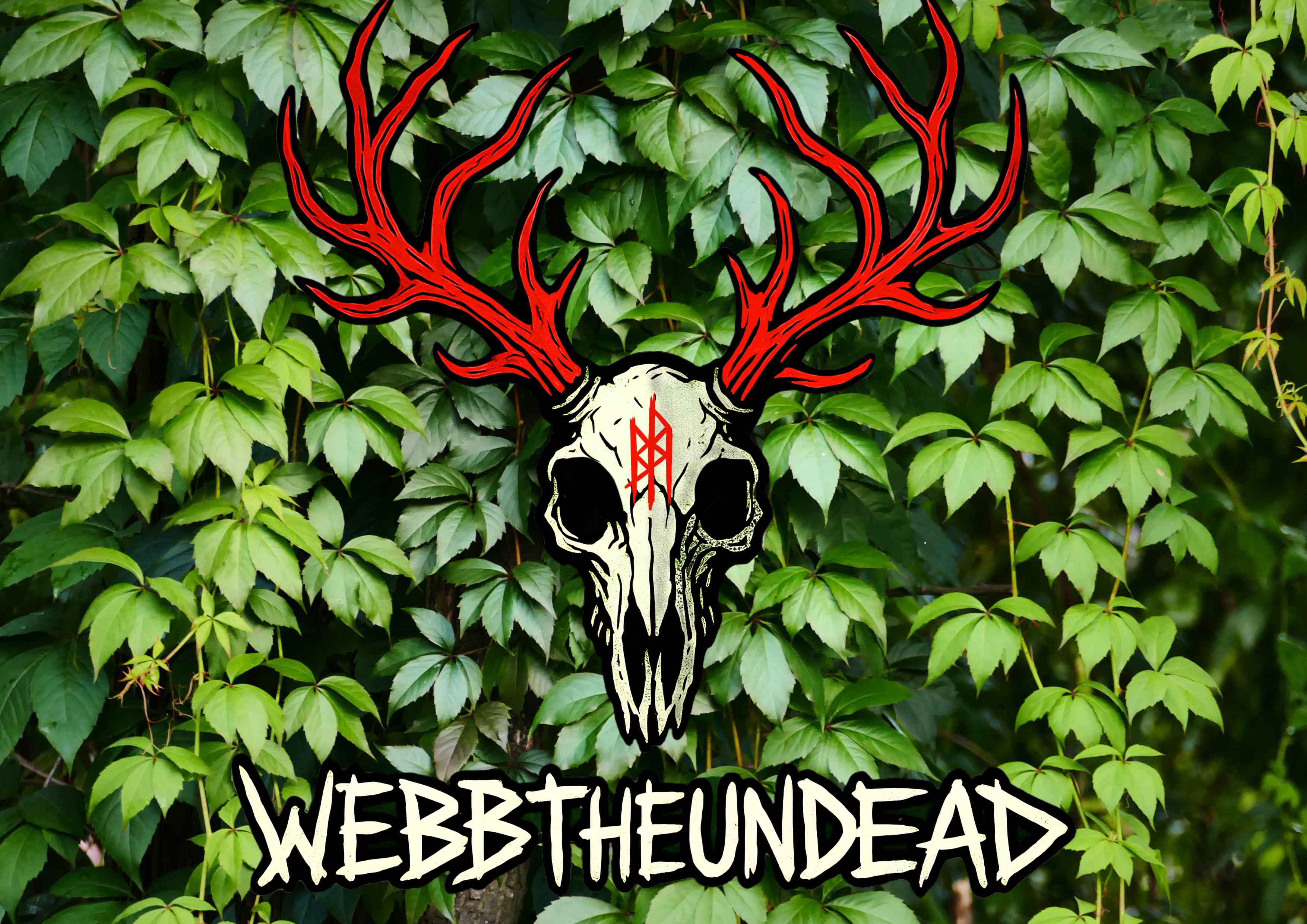 Deer skull with red antlers on a green leafy background, featuring the brand 'Webbtheundead'.